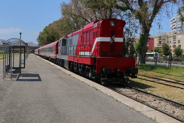 Train waiting on platform for passengers in Durres, Albania.