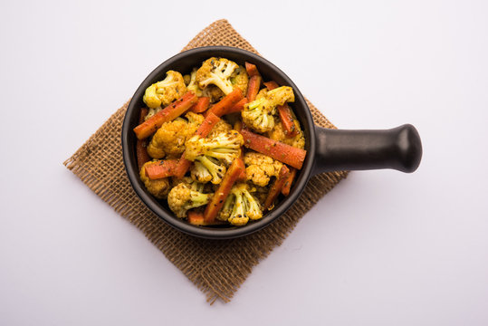 Carrots, cauliflowers achar made using PhoolGobi and Gajar. It's a sweet and sore seasonal pickle from India