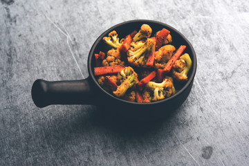 Carrots, cauliflowers achar made using PhoolGobi and Gajar. It's a sweet and sore seasonal pickle from India