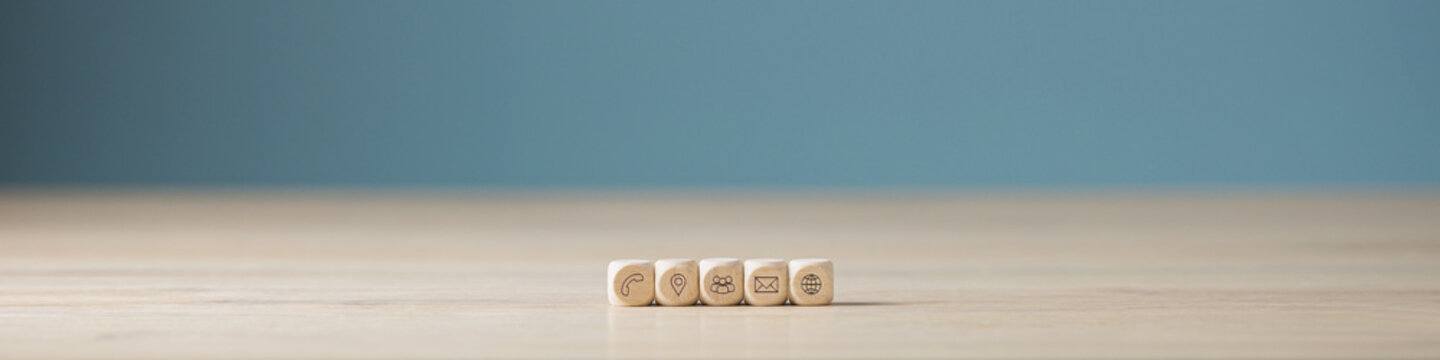 Wooden blocks with contact icons