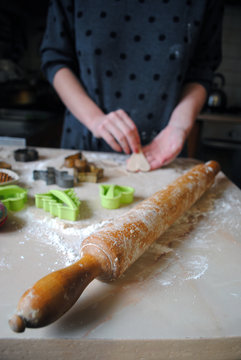 The process of making ginger cookies. Girl is preparing cookies. Gluten free from rice flour. Housewife makes christmas cookies. Close up close shot
