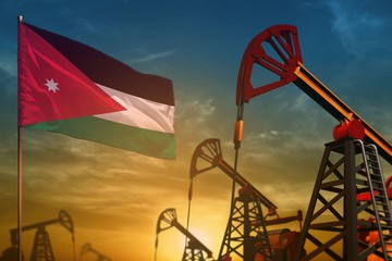 Jordan oil industry concept. Industrial illustration - Jordan flag and oil wells against the blue and yellow sunset sky background - 3D illustration