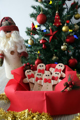 Fototapeta na wymiar Plate with tasty Christmas cookies on wooden table