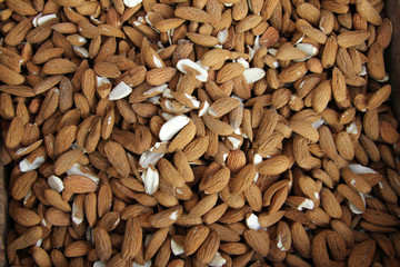 Peeled almonds full frame photo. Almonds. Nuts pattern.