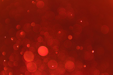 Ruby red bokeh background with soft blur bokeh light effect, background bokeh