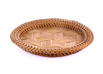 Empty wicker tray isolated on white background