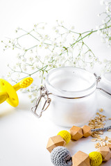 natural organic cosmetics with herbs for baby on white background