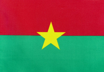 Flag of Burkina Faso on a textile basis close-up