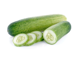Cucumber and slices isolated over white background