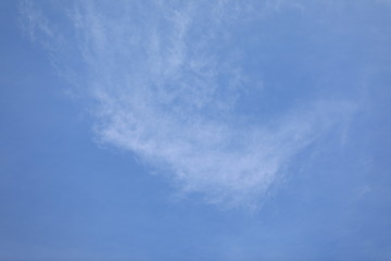 winter white clouds on blue sky background