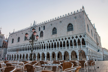 Fototapeta premium Chairs and Tables Set Up in the Square in Front of the Doge's Palace in Venice