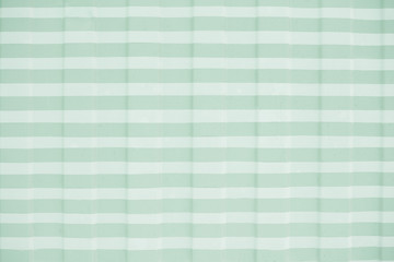 Gently mint striped background to copy space and lettering for design