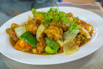 Plate of Chinese stir-fried sweet and sour spare pork rib
