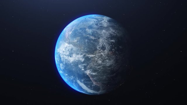 Rotation of the Earth, as ites from day to night. Time lapse of the rotation and city lights. Space exploration.