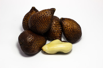Thorny palm or Salak fruit, Tropical fruit has a reddish-brown thorn effect from Indonesian local fruits with White Background.