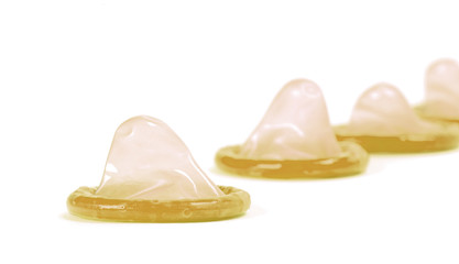 Yellow condom, isolated