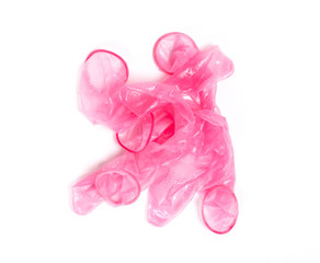 Red condom, isolated