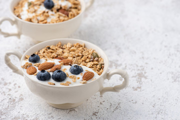 Granola, oatmeal with almond and berry food background