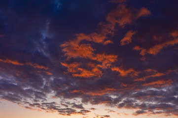 Fototapeta na wymiar Colorful dawn over the city, beautiful clouds in the sky