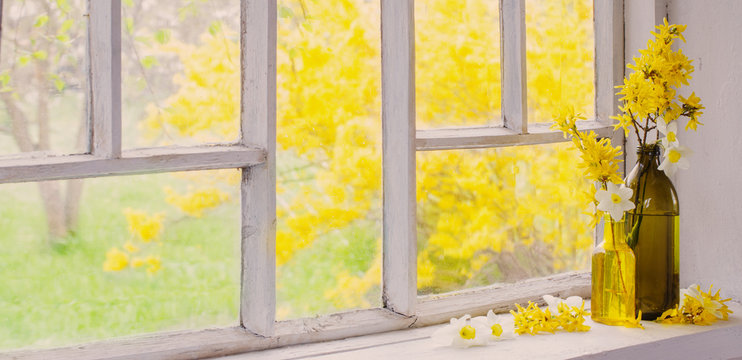 Yellow Spring Flowers On Windowsill