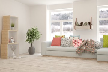 Stylish room in white color with sofa and winter landscape in window. Scandinavian interior design. 3D illustration