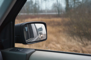 Truck in rear mirror