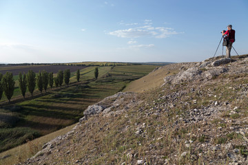 Nature photographer with digital camera.