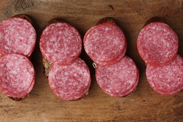 Sandwiches with bread and sausage on the table 