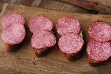 Sandwiches with bread and sausage on the table 