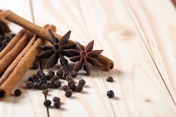 Spices and herbs. Food and cuisine ingredients. Cinnamon sticks, anise stars and black peppercorns...