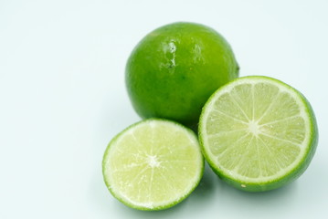 fresh limes on white background
