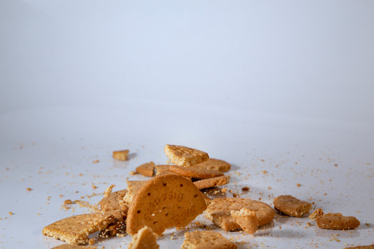 half of biscuit falling 