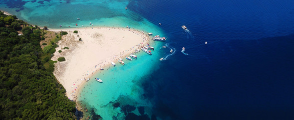 Aerial drone ultra wide photo of iconic small island of Marathonisi with turquoise sea, Zakynthos island, Ionian, Greece