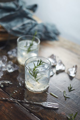 lemonade in glass with rosemary. .