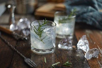 lemonade in glass with rosemary. .