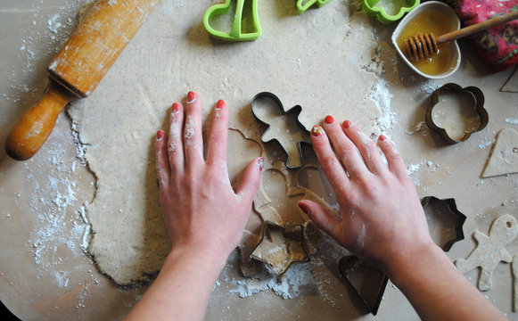 The process of making ginger cookies. Girl is preparing cookies. Gluten free from rice flour. Housewife makes christmas cookies. Close up close shot
