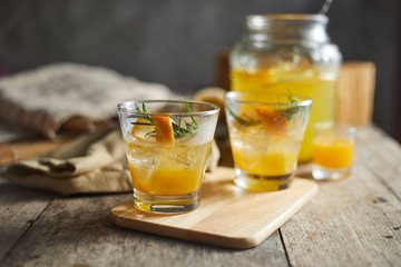 Navel orange cocktail with rosemary..