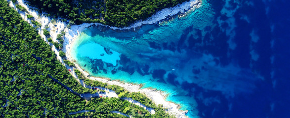 Aerial drone ultra wide photo of paradise turquoise bay with clear sea in exotic Caribbean island