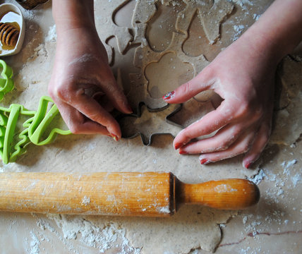 The process of making ginger cookies. Girl is preparing cookies. Gluten free from rice flour. Housewife makes christmas cookies. Close up close shot