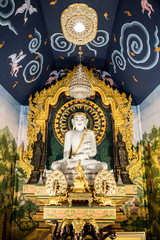 Thai Buddha statue. Buddha image in the middle. Statue of Buddha sitting in meditation.
