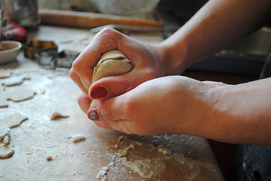 The process of making ginger cookies. Girl is preparing cookies. Gluten free from rice flour. Housewife makes christmas cookies. Close up close shot