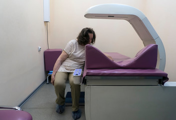 A woman is undergoing research for osteoporosis, bone densitometry of the hands. Detects a decrease in bone density in the early stages