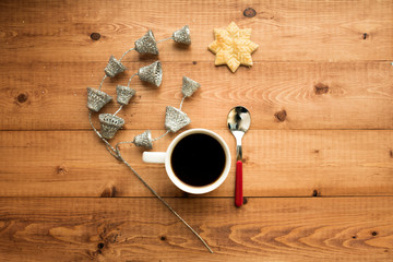 cup of coffee on wooden background with copy space for text