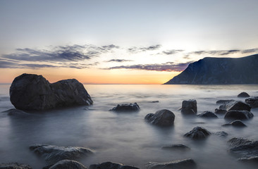 Obraz premium Sunset and exposed rocks in Lofoten, Norway