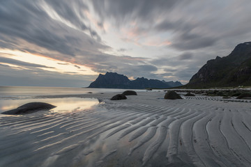 Sand ripples at sunset from Uttakliev Beach in Lofoten, Norway