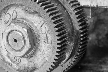 metal cog wheels in gearing at gear box
