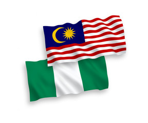 Flags of Nigeria and Malaysia on a white background