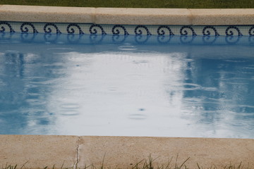 Swimming pool under the rain