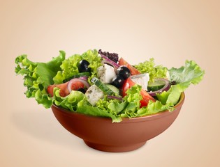 Fresh vegetable salad with chees in a bowl