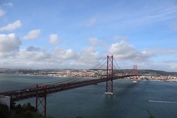 Fototapeta premium Bridge of Lisbon with blue sky